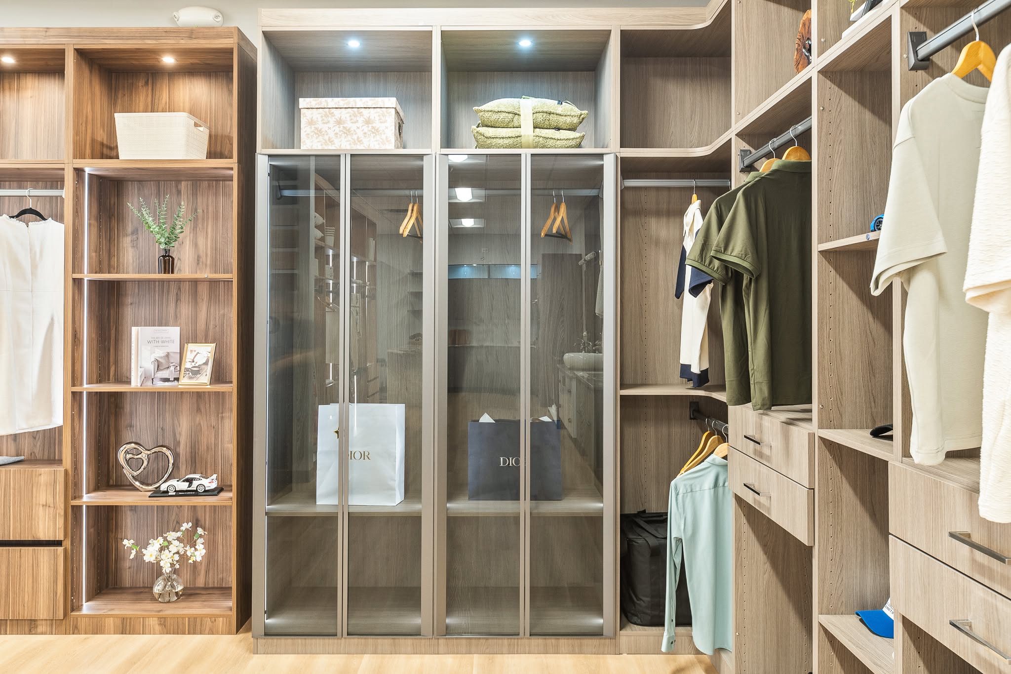 Featured light wood closet project with drawers and hanging storage