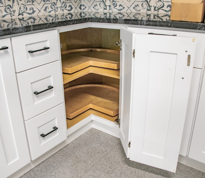 Corner cabinet with rotating wood storage shelves
