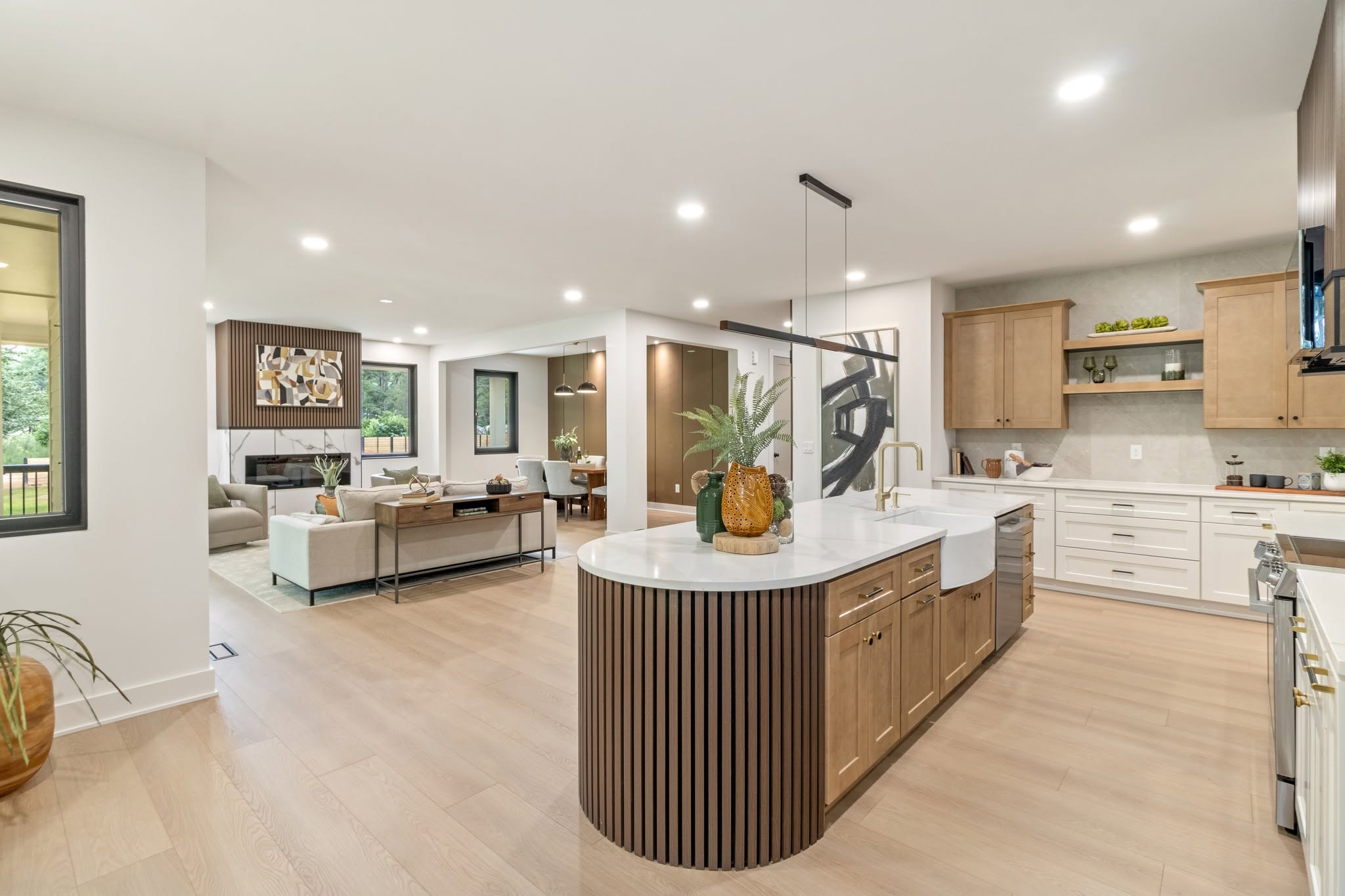 White Shaker kitchen with black backsplash and wood accent features